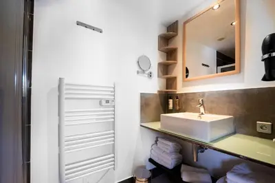 Salle de bains dans l'établissement Le Nid d'Amour