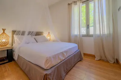 Un ou plusieurs lits dans un hébergement de l'établissement La Cabane Bambou