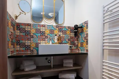 Salle de bains dans l'établissement La Roulotte du Tzigane