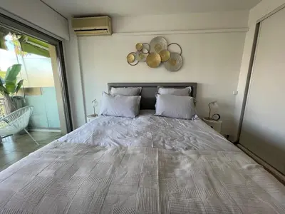 Un ou plusieurs lits dans un hébergement de l'établissement B049-Appartement lumineux à deux pas de la Croisette