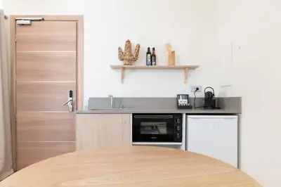 Cuisine ou kitchenette dans l'établissement Le Cocoon Balinais