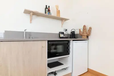 Cuisine ou kitchenette dans l'établissement Le Cocoon Balinais