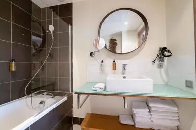 Salle de bains dans l'établissement Le Cocoon Balinais