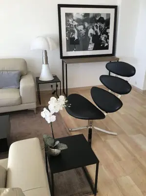 Coin salon dans l'établissement SUPER CANNES FRONT DE MER LUXUEUX VUE UNIQUE