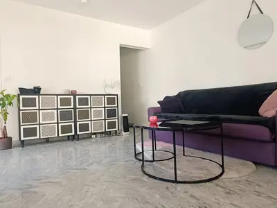 Coin salon dans l'établissement ARA 40m2 CLASSE TERRASSE 35 m2 PISCINE PARKING