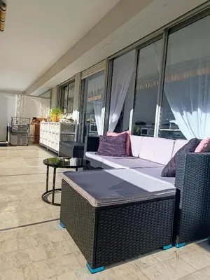Coin salon dans l'établissement ARA 40m2 CLASSE TERRASSE 35 m2 PISCINE PARKING