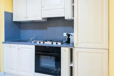 Cuisine ou kitchenette dans l'établissement Royal Cap
