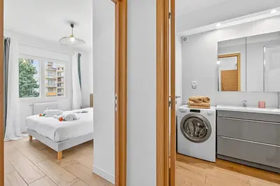 Un ou plusieurs lits dans un hébergement de l'établissement Appartement Le Marly - Happy Rentals