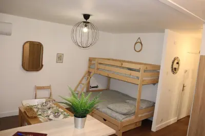 Un ou plusieurs lits dans un hébergement de l'établissement Confort-Appartement cocooning ***