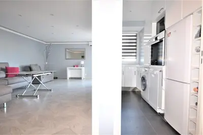 Cuisine ou kitchenette dans l'établissement BEL APPARTEMENT CALME ET TRES LUMINEUX