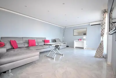 Coin salon dans l'établissement BEL APPARTEMENT CALME ET TRES LUMINEUX