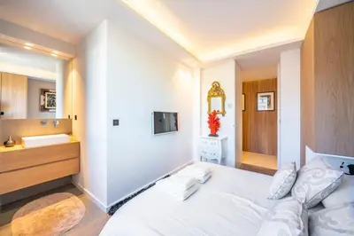 Un ou plusieurs lits dans un hébergement de l'établissement Somptuous 3 bedroom with sea-view on the Croisette