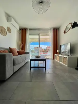 Coin salon dans l'établissement Charmant T2 à 500 m des plages