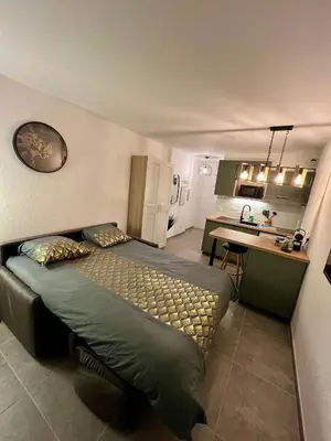 Un ou plusieurs lits dans un hébergement de l'établissement Studio Climatisé, Cosy et Calme au Centre Ville