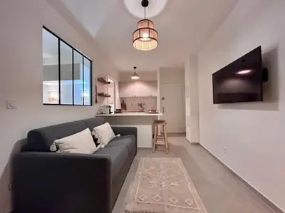 Télévision ou salle de divertissement dans l'établissement Appartement Cannes 1 chambre - QG