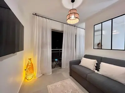 Un ou plusieurs lits dans un hébergement de l'établissement Appartement Cannes 1 chambre - QG