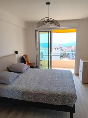 Un ou plusieurs lits dans un hébergement de l'établissement 3 Pièces vue Mer - Clim - 5 Min de la plage à pied