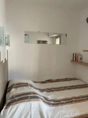 Un ou plusieurs lits dans un hébergement de l'établissement Appt en RDJ à 2 min de la plage