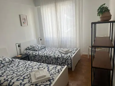 Un ou plusieurs lits dans un hébergement de l'établissement Appartement centre ville & plage