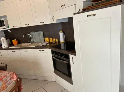 Cuisine ou kitchenette dans l'établissement Appartement plein centre