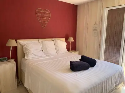 Un ou plusieurs lits dans un hébergement de l'établissement French Riviera Villa