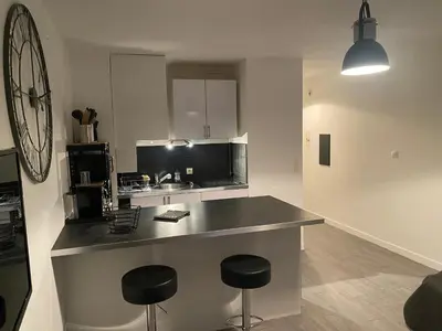 Cuisine ou kitchenette dans l'établissement Beau studio proche mer, gare et commerces