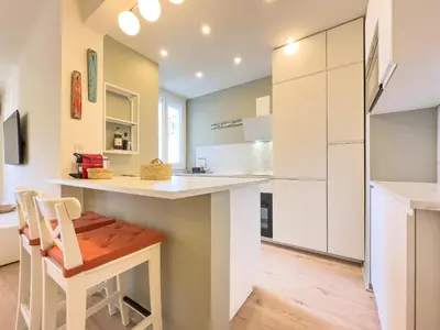 Cuisine ou kitchenette dans l'établissement Le Palm by Winsome Destination