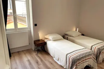 Un ou plusieurs lits dans un hébergement de l'établissement Augusta Palace - T3 **** 74m² - 150m Croisette