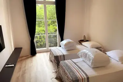 Un ou plusieurs lits dans un hébergement de l'établissement Augusta Palace - T3 **** 74m² - 150m Croisette