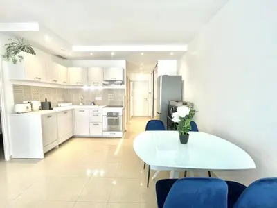 Cuisine ou kitchenette dans l'établissement Colony 2