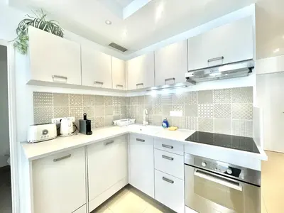 Cuisine ou kitchenette dans l'établissement Colony 2