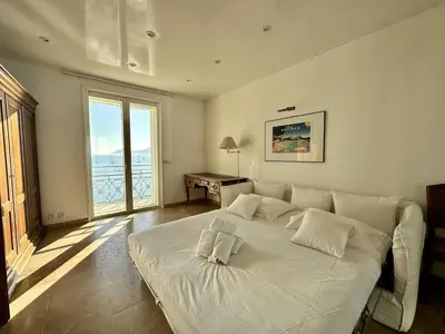 Un ou plusieurs lits dans un hébergement de l'établissement Cannes Croisette - Appartement 5 pièces face mer