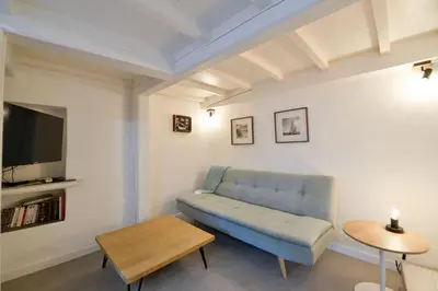 Coin salon dans l'établissement LE PETIT BATEAU - NEW cosy/charming studio/mezzanine for 3 - AC/WIFI
