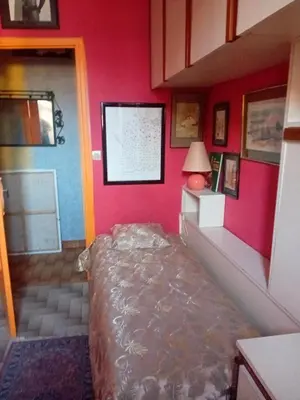 Un ou plusieurs lits dans un hébergement de l'établissement Chambre d hôte artistique cannes