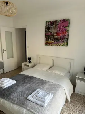 Un ou plusieurs lits dans un hébergement de l'établissement Appartement Cannes