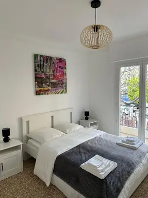 Un ou plusieurs lits dans un hébergement de l'établissement Appartement Cannes