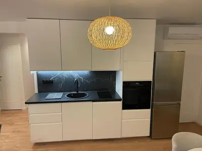 Cuisine ou kitchenette dans l'établissement T3 Aperçu Mer