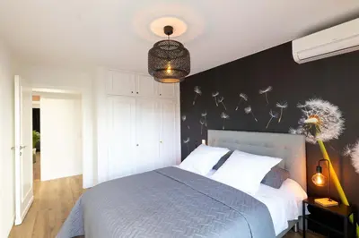 Un ou plusieurs lits dans un hébergement de l'établissement Somptueux appartement 20m plages avec vue mer