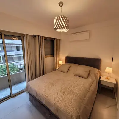 Un ou plusieurs lits dans un hébergement de l'établissement Bell Appartement Cannes