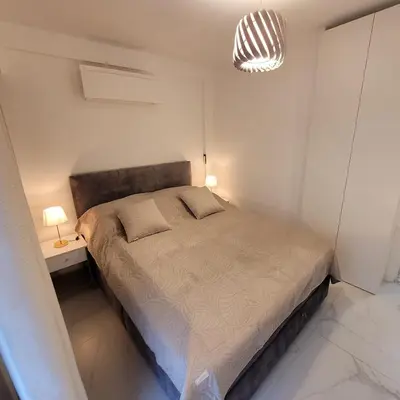 Un ou plusieurs lits dans un hébergement de l'établissement Bell Appartement Cannes