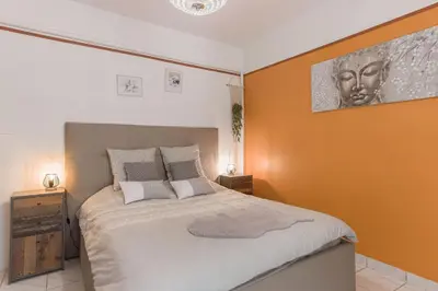 Un ou plusieurs lits dans un hébergement de l'établissement La Maison Fleurie by Halldis