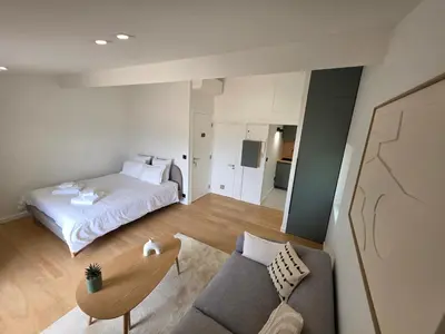 Un ou plusieurs lits dans un hébergement de l'établissement Face Port Vauban - Appartements au cœur du Vieil Antibes