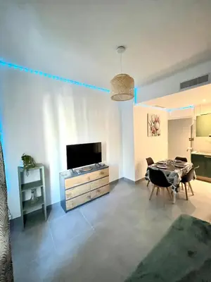 Télévision ou salle de divertissement dans l'établissement Appartement 3 pièces GREEN ART ****
