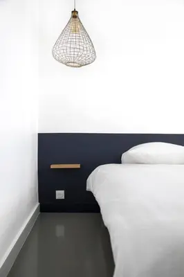 Un ou plusieurs lits dans un hébergement de l'établissement Appartement 3 pièces / proche plage / centre / clim