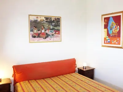 Un ou plusieurs lits dans un hébergement de l'établissement Splendide T2 avec terrasse et garage, à 3 min de la plage, 4 couchages - FR-1-252A-120
