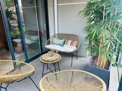 Coin salon dans l'établissement B035 Magnifique appartement neuf a deux pas du centre