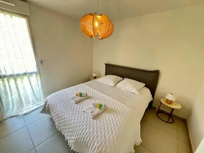 Un ou plusieurs lits dans un hébergement de l'établissement B035 Magnifique appartement neuf a deux pas du centre