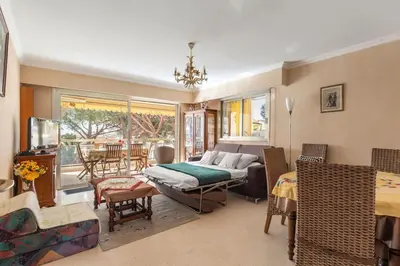 Coin salon dans l'établissement Appartement vue piscine, proche mer