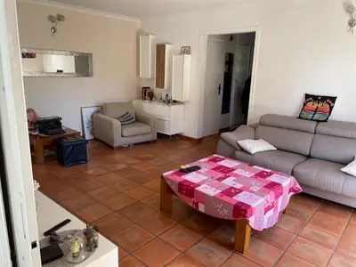 Coin salon dans l'établissement magnifique maison 6 personne piscine