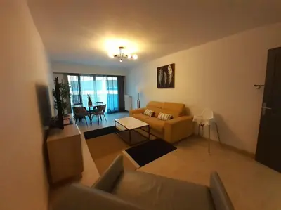 Coin salon dans l'établissement Bel appartement à côté des plages 2 à 5 Personnes